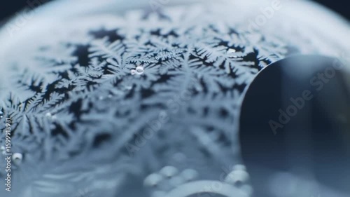 Wallpaper Mural Intricate blue frost patterns form delicate crystalline structures on a cold with soft light Torontodigital.ca