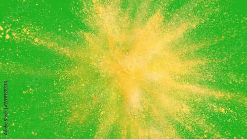Exploding color powder and spreading in the air on green screen background