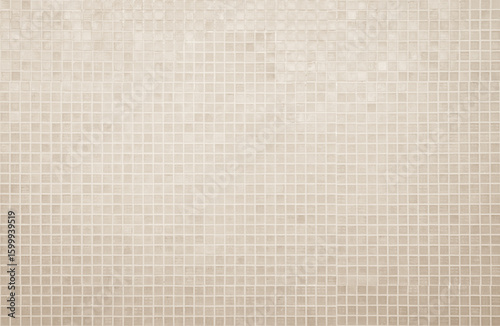 Cream light ceramic wall and floor tiles mosaic background in bathroom and kitchen. Design pattern geometric with grid wallpaper texture decoration pool. Simple seamless abstract surface clean. © Manitchaya
