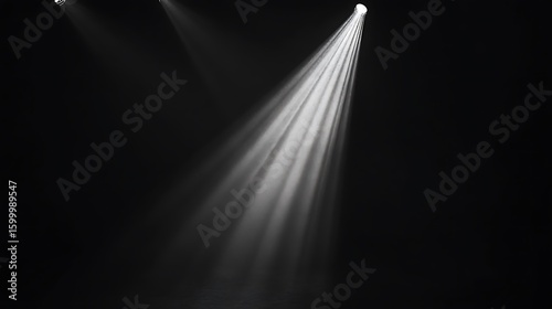 Stage lights illuminating a dark space (1)