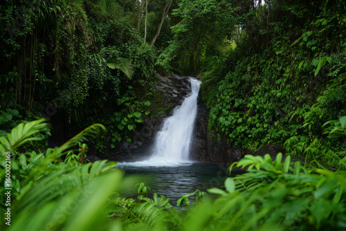 Nature's majestic cascade flows through a vibrant green forest, creating a serene river landscape of waterfalls over moss-covered rocks