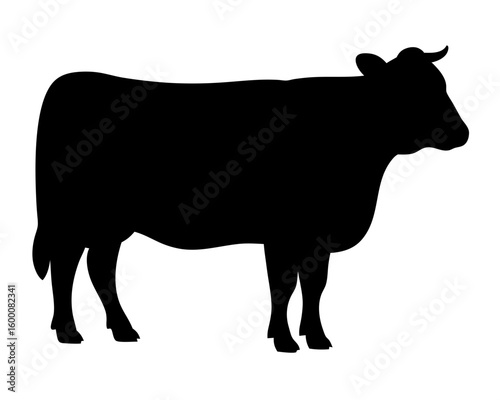 Silhouette of a Cow Standing with Its Head Turned to the Right