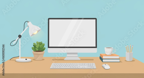Modern desktop computer setup with desk lamp, plant, coffee cup, books, and pencils