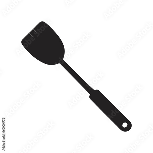 Simple black silhouette of a cooking spatula isolated on white background for various kitchen concepts