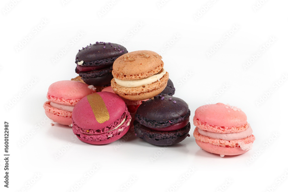 Fototapeta premium Colorful assortment of macarons isolated on a white background