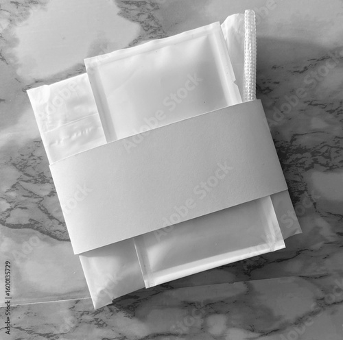 Sanitary pad and wipe pack
