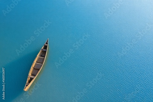 Silent canoe drifts on azure expanse, echoing serenity of Obon Festival's reflective spirit, whispering secrets of intangible horizons