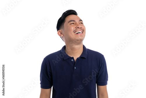 Happy Asian man looking up and laughing with joyful expression isolated on transparent background