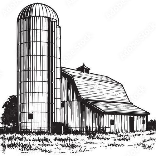 Rustic barn with silo in rural landscape during sunny day