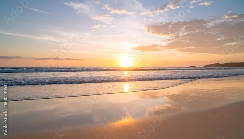 Warm beach sunset reflected on shore