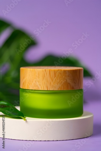Frosted Green Glass Jar with Wooden Lid on Minimalist Platform