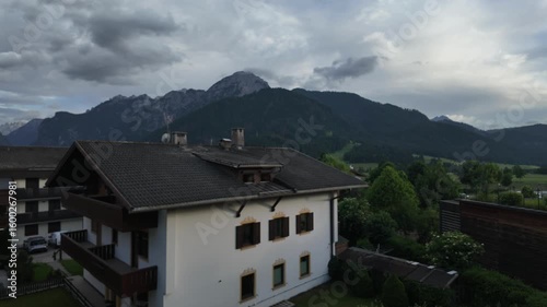 Wallpaper Mural Hyperlapse movement from an apartment complex at Toblach aka Dobbiaco with rolling clouds and time in motion, Trentino-Alto Adige, South Tirol, Italy. Torontodigital.ca