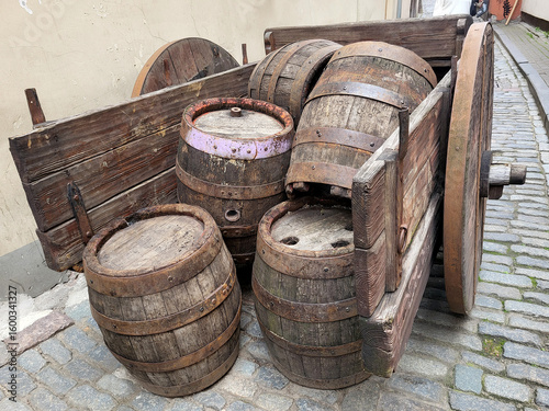 very old vintage oak wooden beer wine barrels in perfect condition on wain