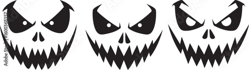 Three spooky grinning skull faces silhouette