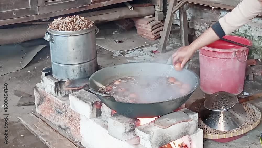 The process of making Indonesian boiled pindang eggs cooked with spices and leaves gives it a unique color and taste, especially when cooked using a wood-fired cooking stove.