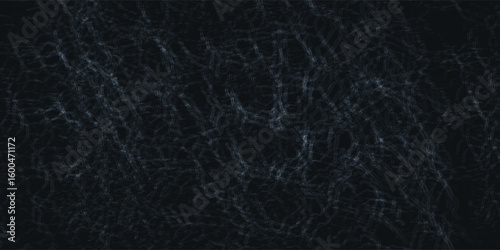 Dark cracked surface texture with fine fracture lines, creating an abstract and mysterious background ideal for horror, aged,