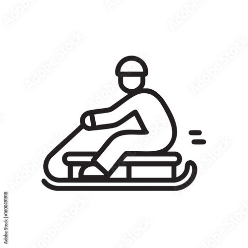 Winter sport activity with a person riding a sled on snow