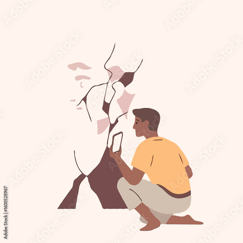 Young man sketching abstract shapes on wall with smartphone  