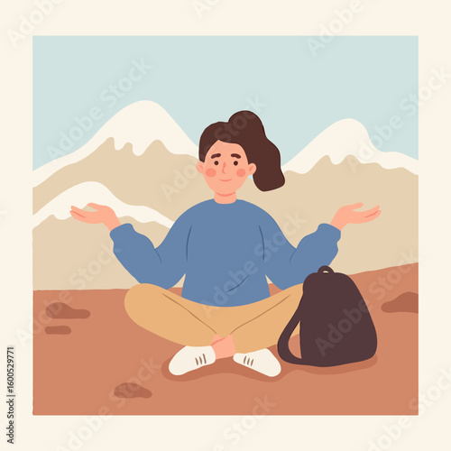 Young woman meditating outdoors with backpack in mountainous landscape  