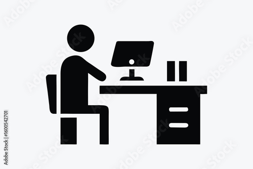Simple silhouette icon of a person working at a desk with a computer