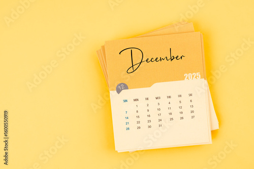 Wallpaper Mural December 2025 calendar card on yellow color background with copy space. Torontodigital.ca