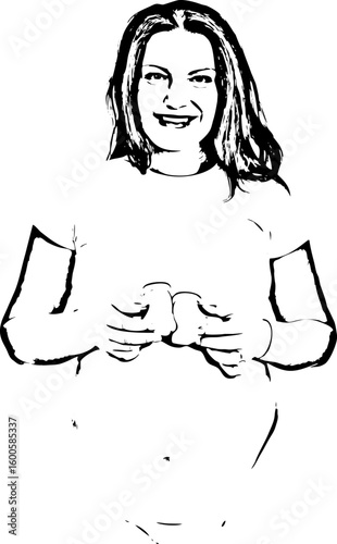 Pregnant holding tiny shoes