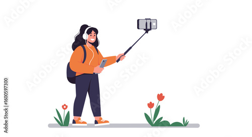Young woman taking selfie with smartphone in garden with flowers  