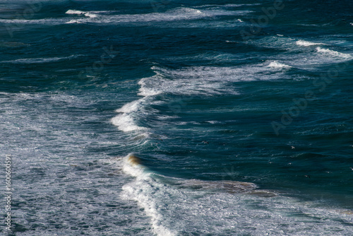 high angle view of the waves on the winter sea