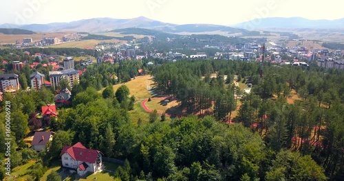 Aerial nature  landscape flight over picturesque mountains forests meadows