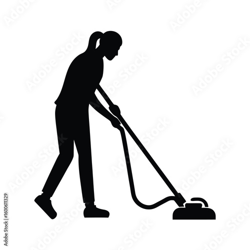 Silhouette of a woman using a vacuum cleaner