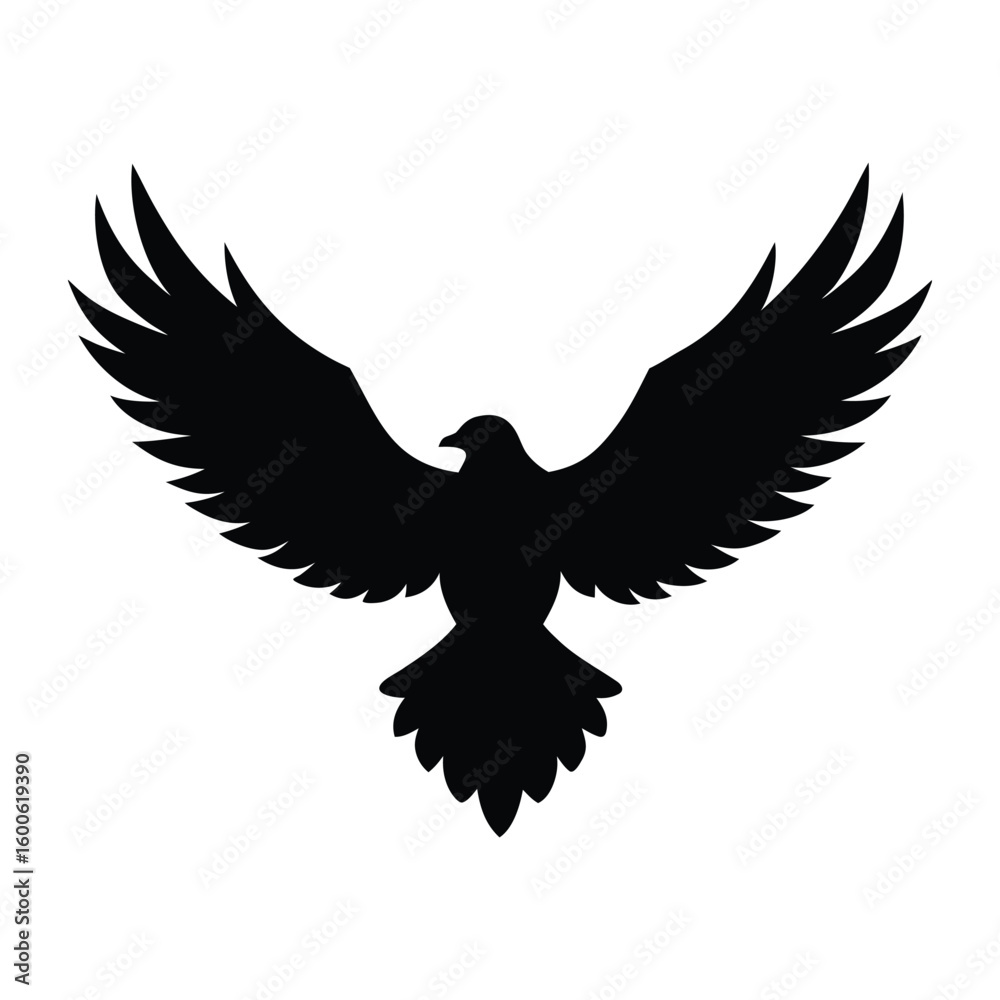 Obraz premium Black silhouette of a bird with wings spread wide