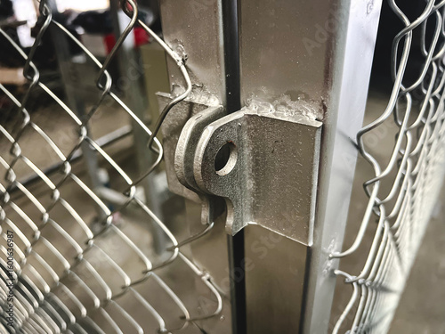 Close to the key chain connection at the steel grating door structure