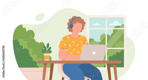 Person working from home on laptop, wearing headphones, near window. Ideal for remote work, freelance, and work-life balance concepts.