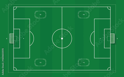 Aerial view of a green soccer field with white markings