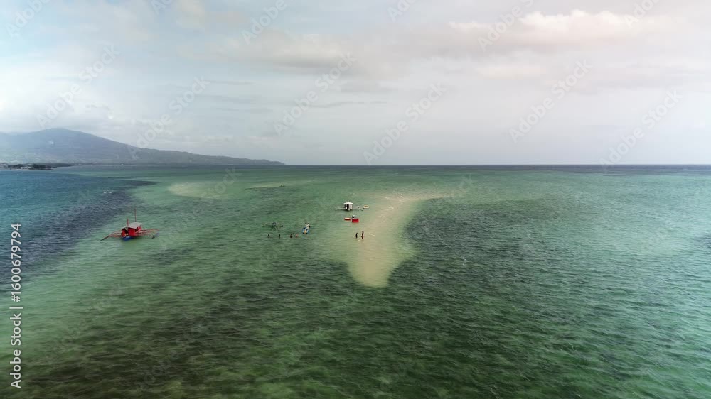 Sandbar sideview, front view boats beach ocean drone