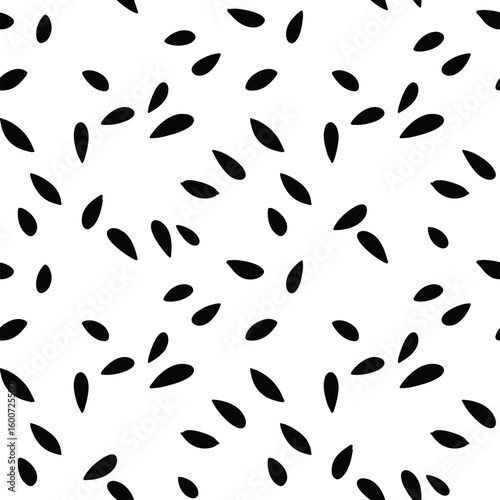 Abstract black seed pattern on white background minimalist design