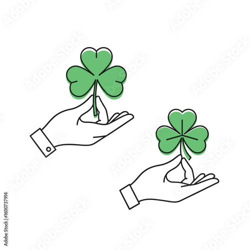 Two hands hold a lucky clover leaf representing good fortune and irish celebration