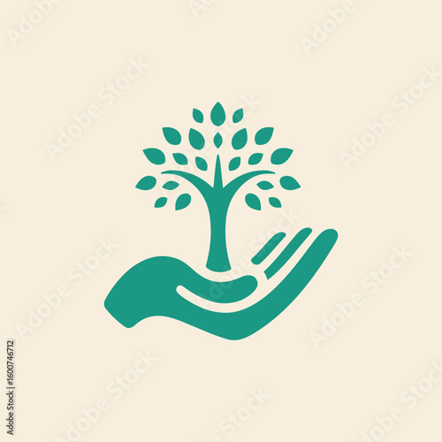 Green tree growing from an open hand symbolizing care protection and growth in nature and environment