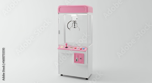 Pink claw machine on white background, evoking arcade and game concepts.