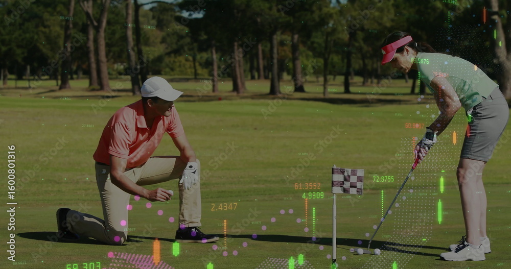 Obraz premium Golfing partners kneeling marking balls and lining putts on green, with checkered flag and overlays