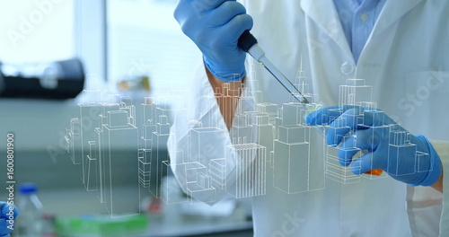 Using micropipette scientist in coat and gloves transferring sample at lab bench, with city overlay