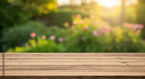 Wooden Tabletop with Blurred Green Garden Background high quality