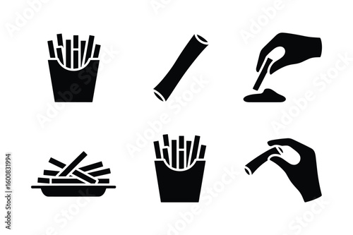 French fries in container dipping into sauce and on plate food