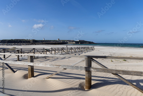 View from beach Playa Chica of causeway between Mediterranean Sea and Atlantic Ocean, Punta de Tarifa, Tarifa, Spain, Andalusia