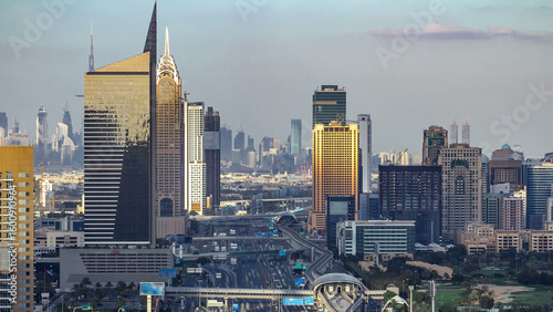 Aerial view of Dubai marina skyscrapers and Internet city towers timelapse wi...