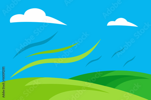 windy grassland under blue sky
