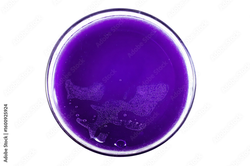Obraz premium a glass of purple liquid with a white background