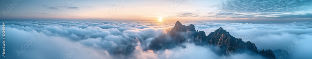 Obraz premium Mountain Above Clouds at Sunrise