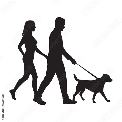Couple walking with their dog in silhouette