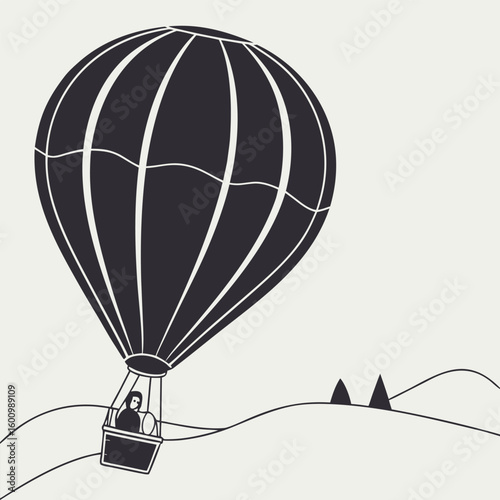 Man piloting hot air balloon soaring over rolling hills and distant trees